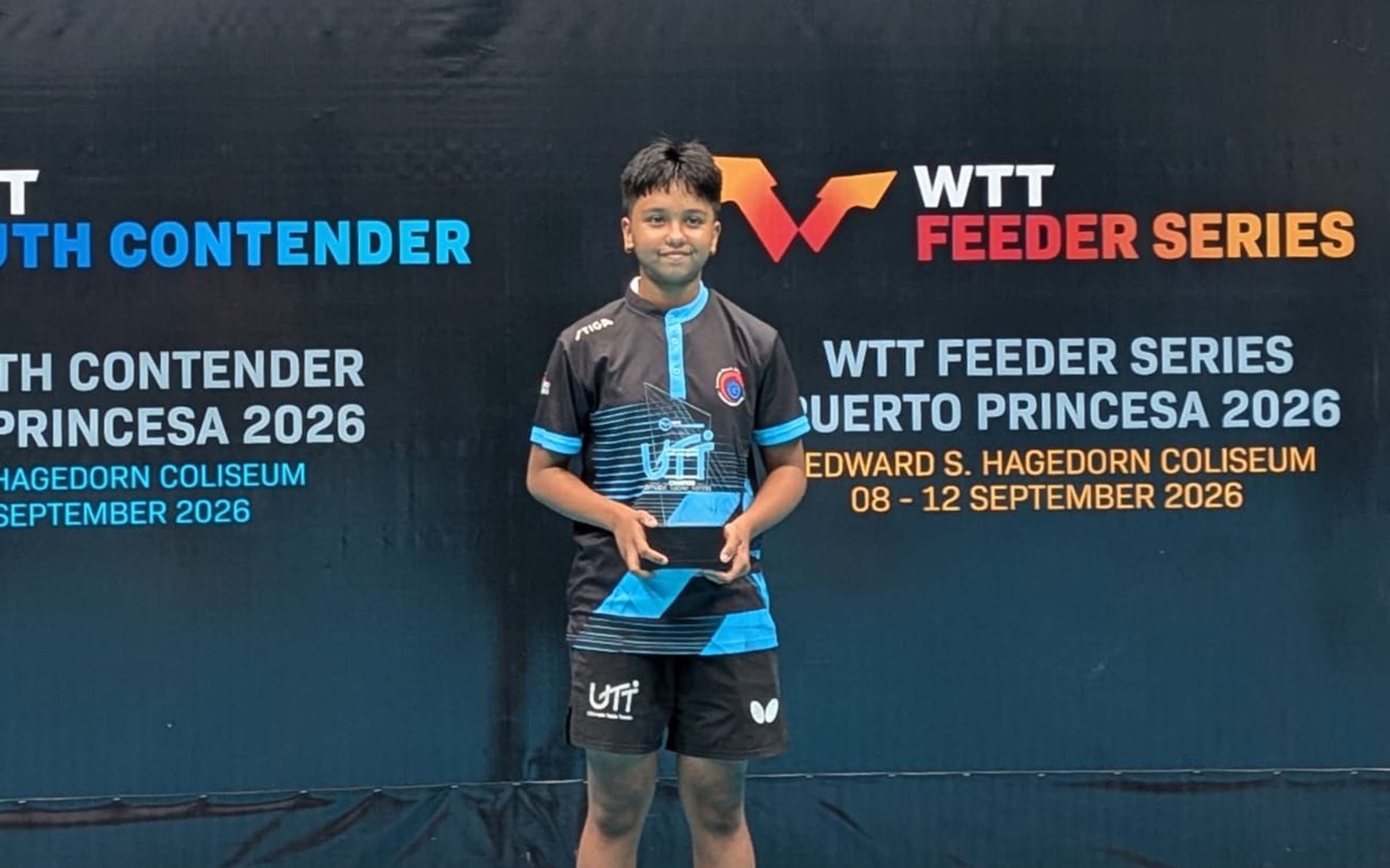 Divija wins international title